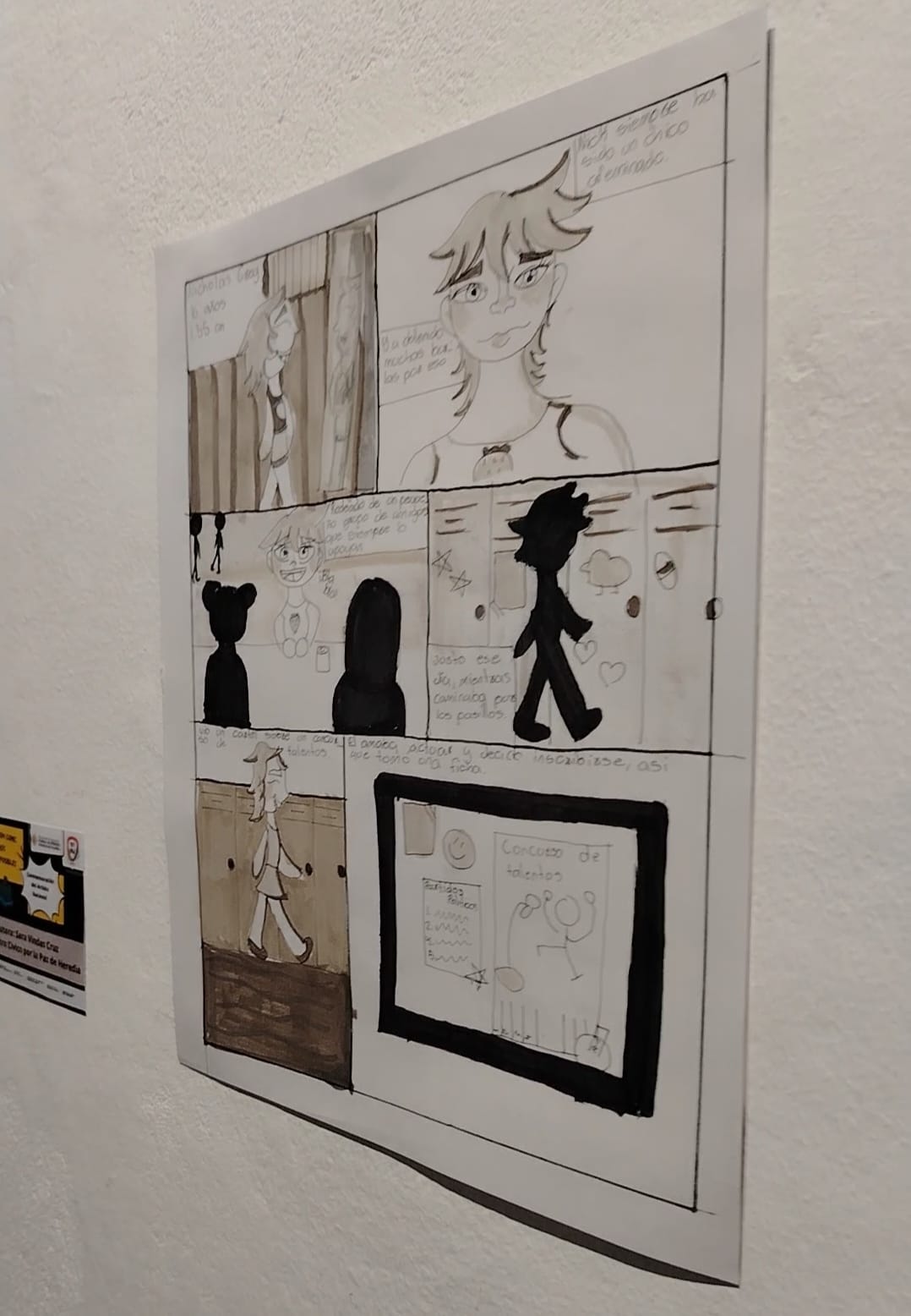 Un dibujo cómic con un joven y unas sombras en un entorno colegial.