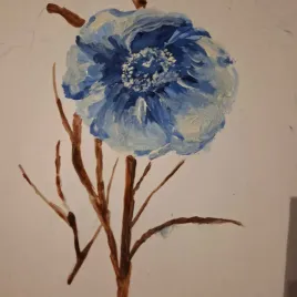 Dibujo de una flor azul y tallos café